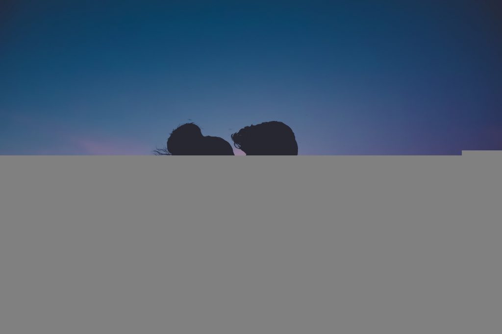 A man and a woman hugging in the dark - how to be the gravity guy
